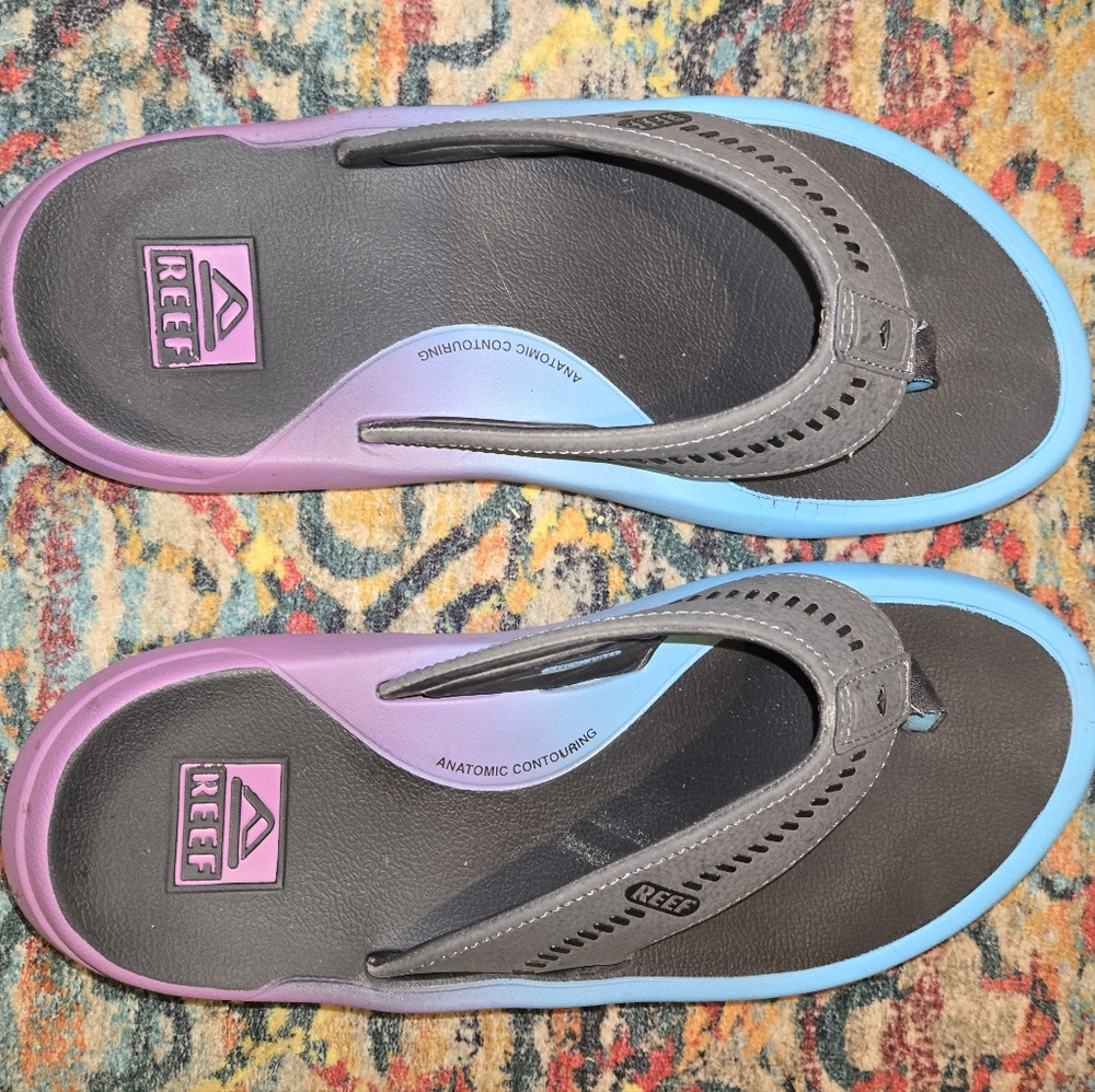 Reef Gray Flip Flops with Purple and Blue Accents. Lightly Worn.